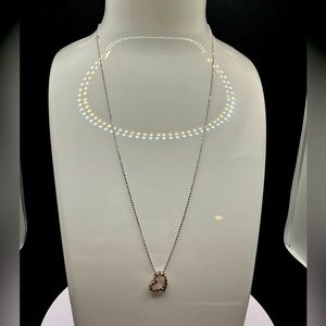 18k white gold with open heart diamond